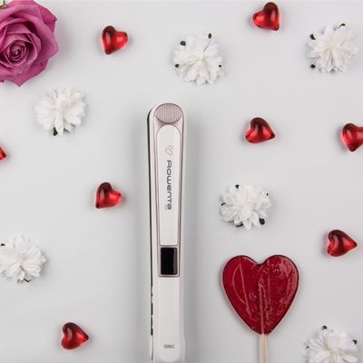 Placa de par Rowenta Premium Care 7/7 SF7460F0, setare temperatura 130&deg; - 200&deg;C, generator de ioni, invelis Cashmere Keratin cu ulei de argan, incalzire rapida in 30s, roz & alb