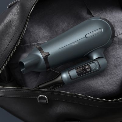 Uscator de par pliabil Rowenta Nomad CV4753F1, 2200W, 3 setari de temperatura, 2 trepte de viteza, functie aer rece, inel de agatare, grilaj detasabil, geanta transport, verde & negru