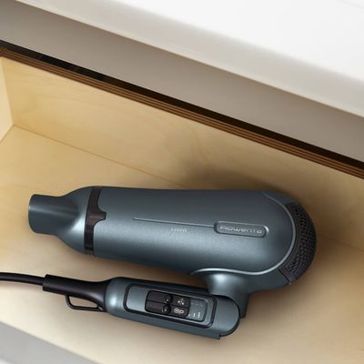 Uscator de par pliabil Rowenta Nomad CV4753F1, 2200W, 3 setari de temperatura, 2 trepte de viteza, functie aer rece, inel de agatare, grilaj detasabil, geanta transport, verde & negru